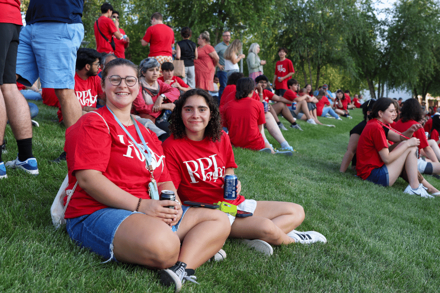 Two students smiling in RPI t-shirts