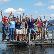 Student on a dock in Lake George