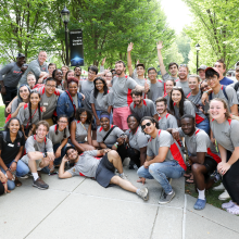 Student Leaders smiling in a group for a photo during orientation.